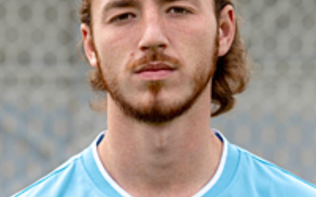 LATE GOALS EARN BLUES A POINT