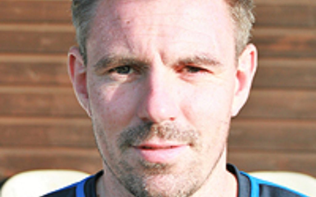 LATE PENALTY EARNS BLUES POINT